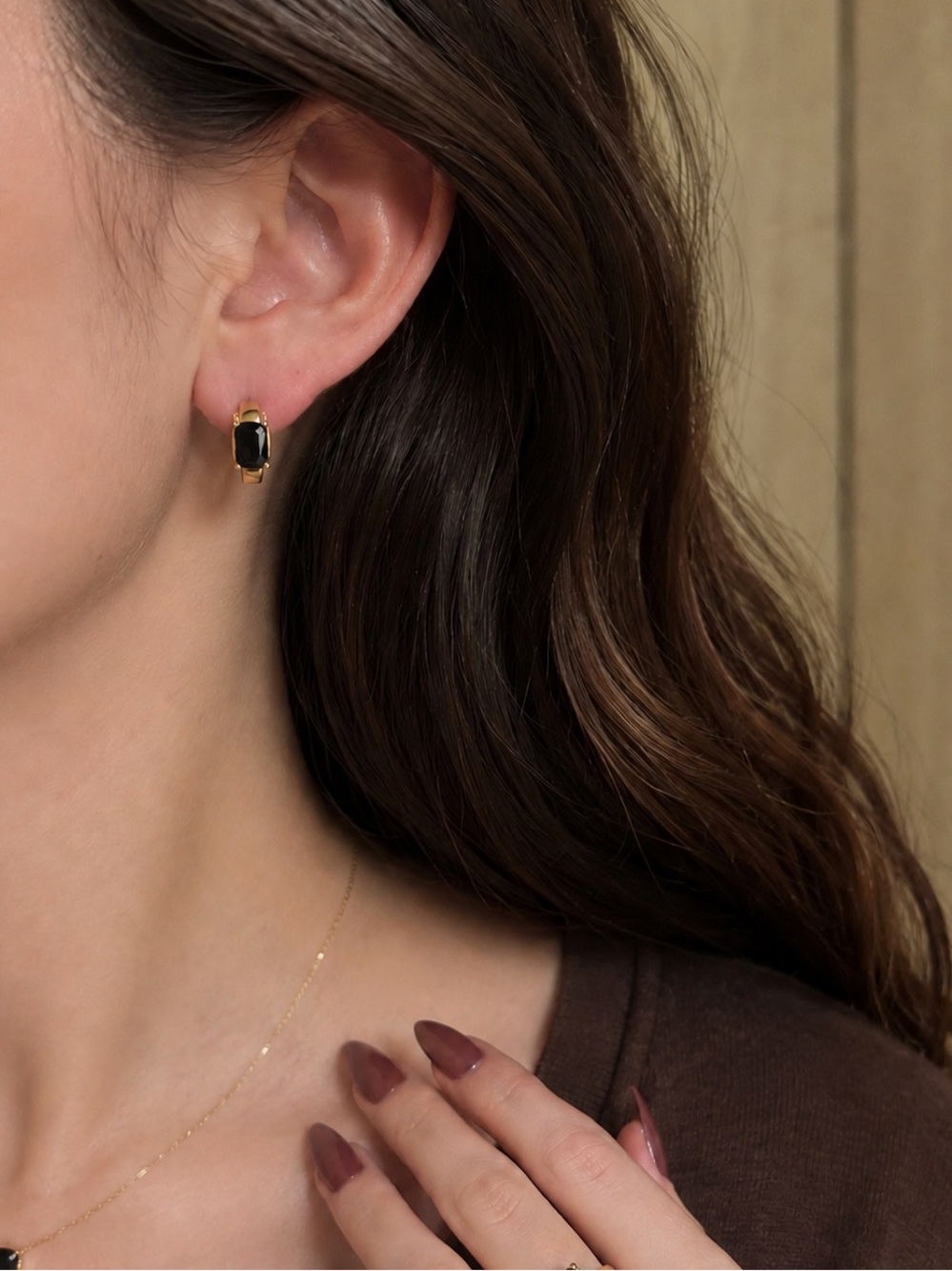 Black onyx yellow gold huggie earrings